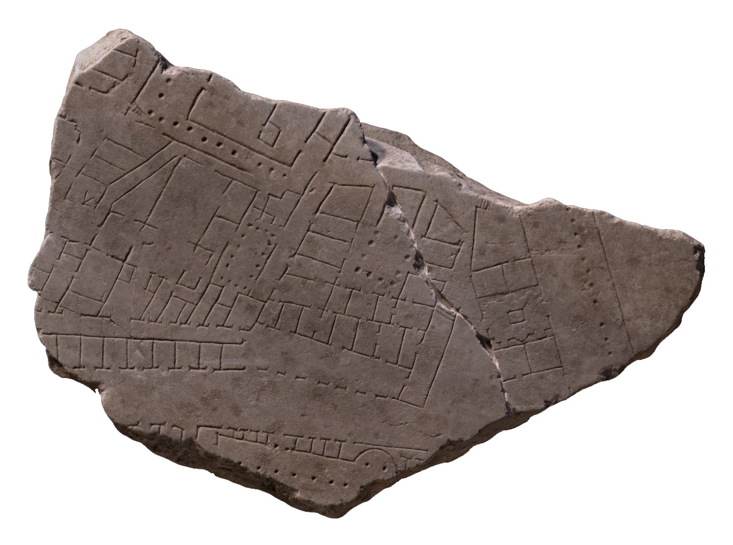 Broken stone fragments of the forma urbis. You can see the lines of roads and buildings marked on them